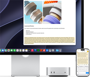 Mac mini de face, glissé sous un Studio Display, un iPhone se trouve à droite de l'appareil et de l'écran, du texte sélectionné avec les commandes Couper, Copier, Coller et Remplissage automatique en haut de l'iPhone correspond au texte surligné à l'écran, illustrant le fonctionnement du presse-papiers universel