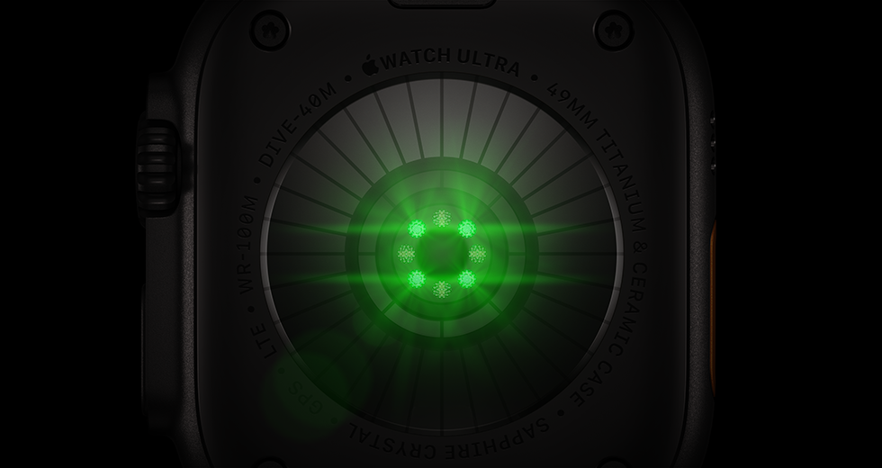 Dos de l'Apple Watch Ultra 4, boîtier en titane, noir, plusieurs capteurs ronds avec LED vertes allumées