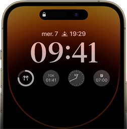 Vue avant de l'iPhone 14 Pro montrant l'écran toujours activé sur lequel figurent l'heure, la date, quatre widgets, et plus encore.