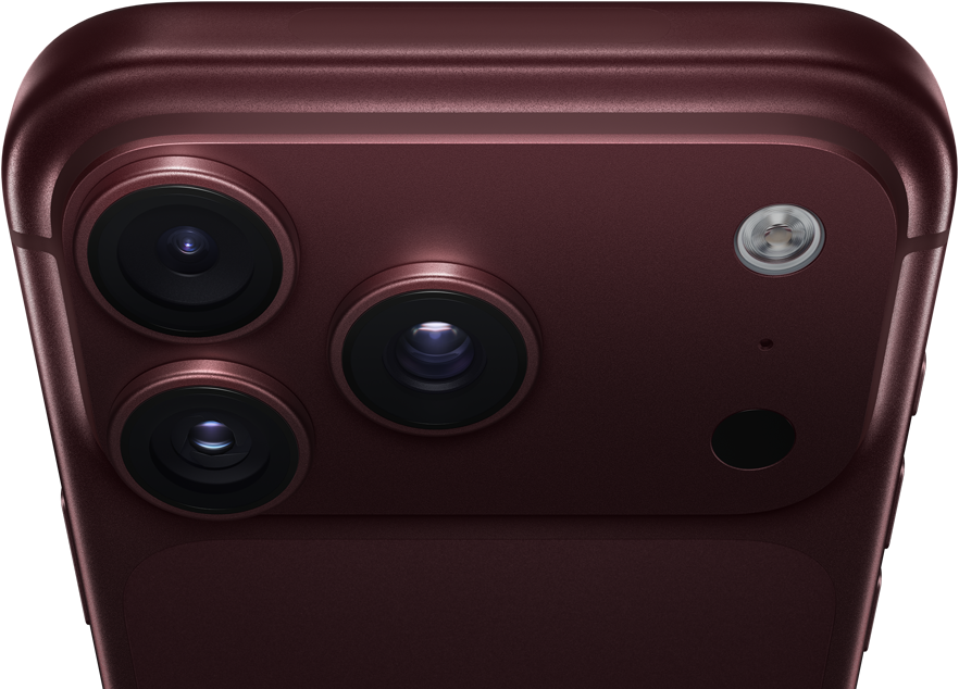 iPhone 18 Pro Max, finition bordeaux (rouge foncé), face arrière, système caméra Pro Fusion au sommet, 3 objectifs, lamelles d'ouverture variable partiellement fermées, flash, micro et scanner LiDAR, face supérieure, antenne cellulaire, côtés plats, bords arrondis