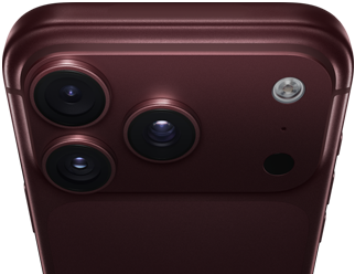 iPhone 18 Pro Max, finition bordeaux (rouge foncé), face arrière, système caméra Pro Fusion au sommet, 3 objectifs, lamelles d'ouverture variable partiellement fermées, flash, micro et scanner LiDAR, face supérieure, antenne cellulaire, côtés plats, bords arrondis