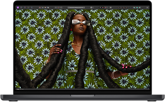 Une image photographique colorée d'une personne souligne l'éclat de l'écran XDR du MacBook Pro.