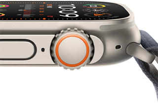 Apple Watch Ultra 2 montrant le boîtier en titane robuste, l'écran plat, la digital crown et le bouton latéral
