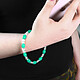 Avis Avizar Bijou Téléphone Bracelet Perles ovales et rondes Collection Cosmopoli Turquoise